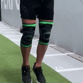 Rodillera deportiva de compresión con soporte lateral